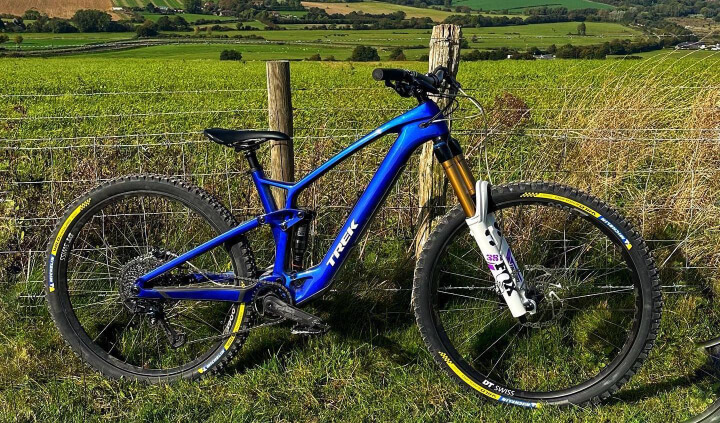 trek fuel blue e-bike on a mountain trek fuel blue e-bike on a mountain